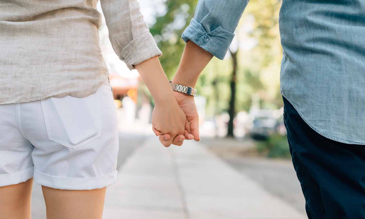 guy and girl holding hands