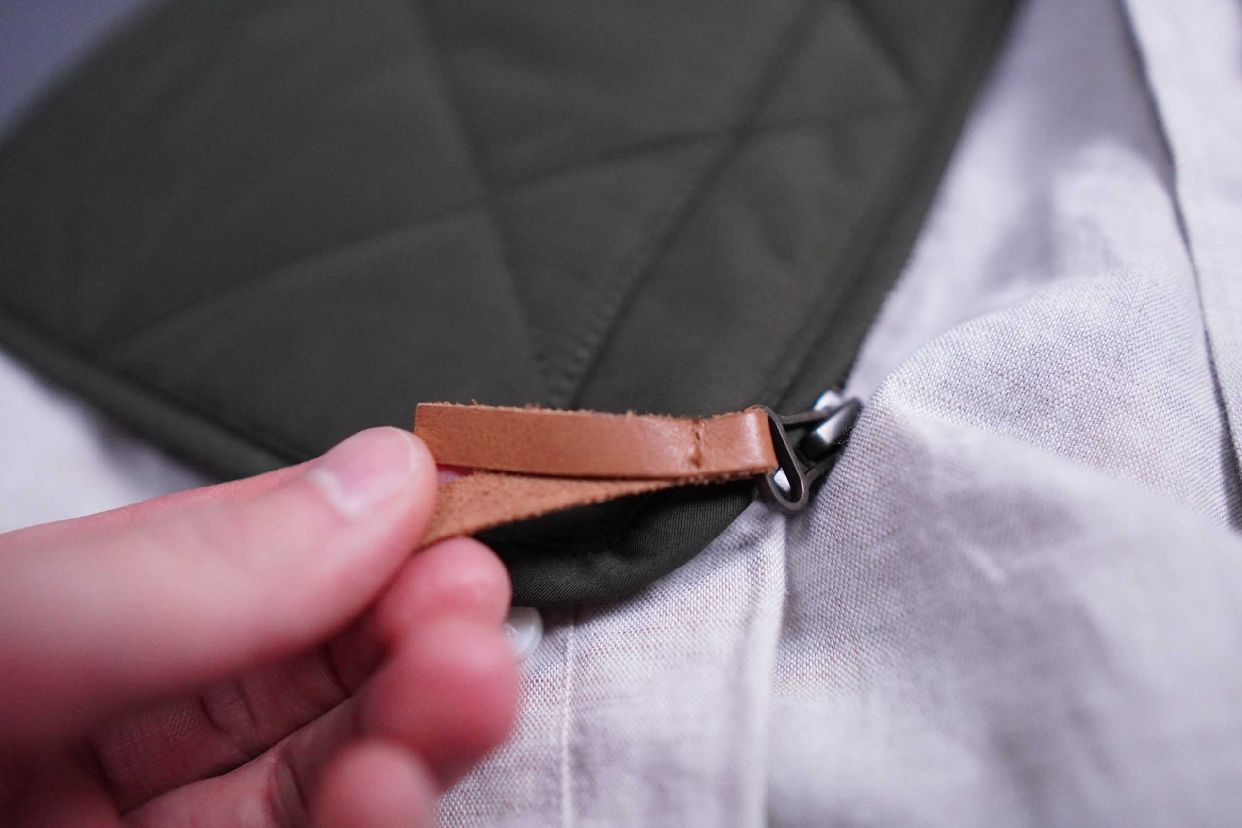 sussex vest zipper leather trim detail