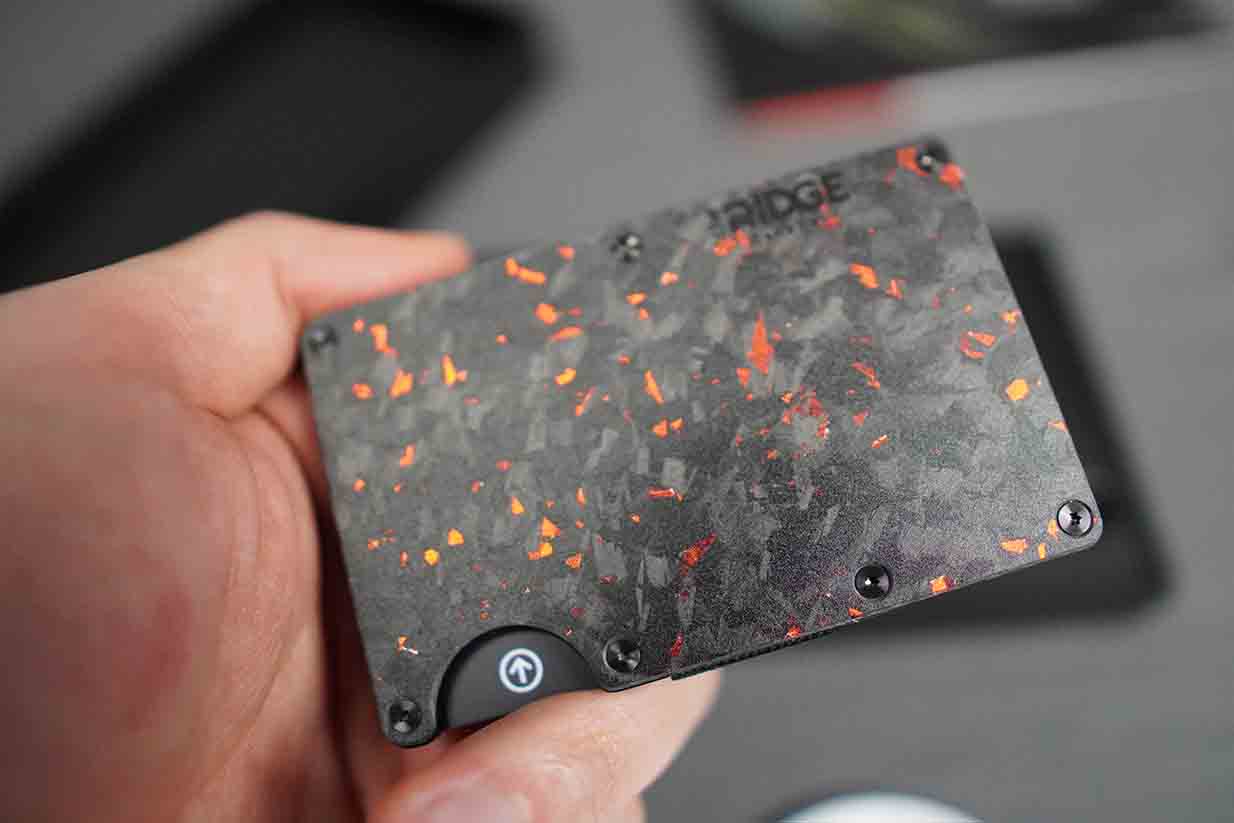the ridge wallet forged ember in hand