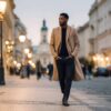 streamlined camel topcoat dark wash jeans black chelsea boots